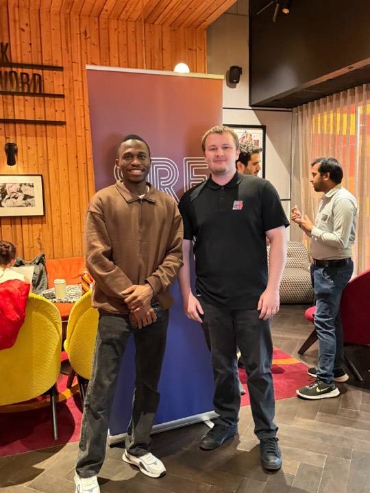 Gabriel with an SRE Day London attendee